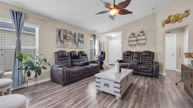 7120 Forest Mere Dr, Riverview, FL 33578 - living room with vaulted ceiling, wood finished floors, and a ceiling fan