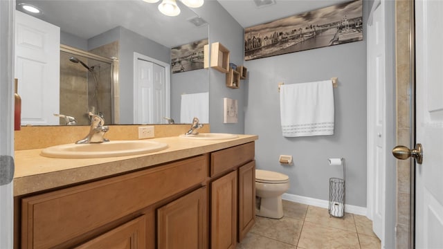 7120 Forest Mere Dr, Riverview, FL 33578 - bathroom featuring a shower stall, double vanity, and tile patterned floors
