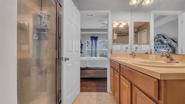 7120 Forest Mere Dr, Riverview, FL 33578 - full bathroom featuring double vanity, tile patterned flooring, a shower stall, and ensuite bathroom