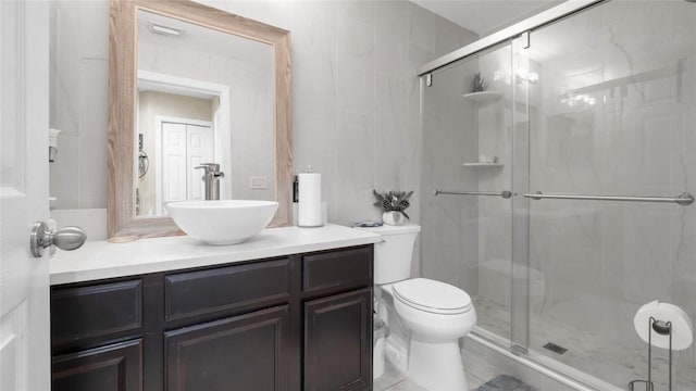 7120 Forest Mere Dr, Riverview, FL 33578 - full bathroom featuring vanity, a shower stall, and tile walls