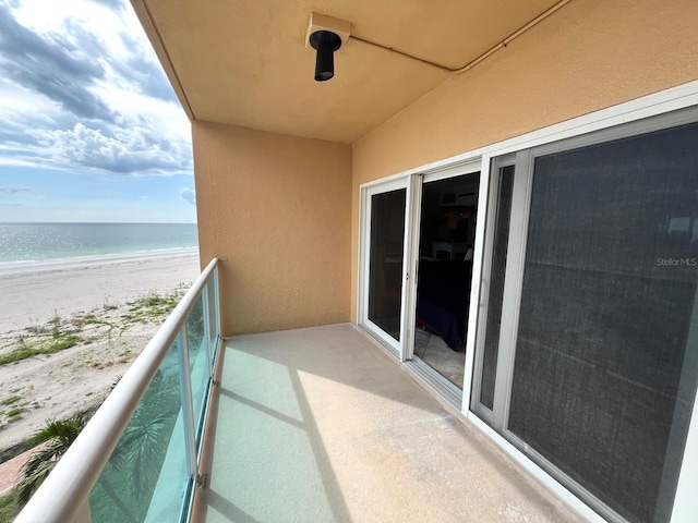 880 Mandalay Ave Unit N311, Clearwater Beach, FL 33767 - balcony with view of water and beach