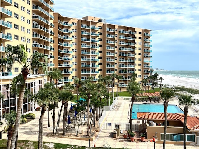 880 Mandalay Ave Unit N311, Clearwater Beach, FL 33767 - view of apartment building / complex with view of water and beach