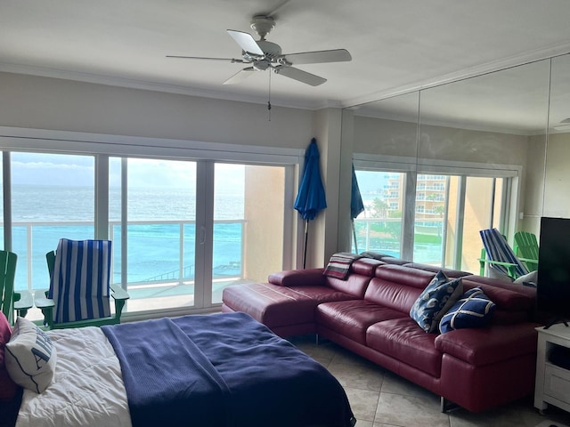 880 Mandalay Ave Unit N311, Clearwater Beach, FL 33767 - bedroom featuring access to exterior, multiple windows, a water view, light tile patterned flooring, and crown molding