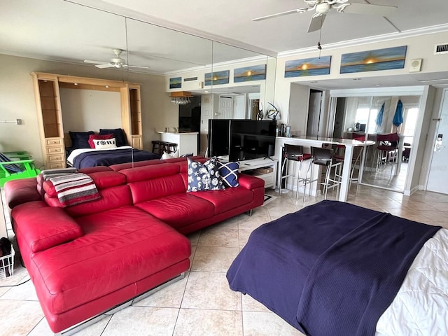 880 Mandalay Ave Unit N311, Clearwater Beach, FL 33767 - living area with ceiling fan, ornamental molding, and tile patterned flooring