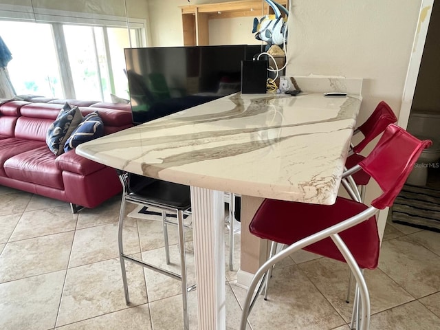 880 Mandalay Ave Unit N311, Clearwater Beach, FL 33767 - kitchen featuring tile patterned flooring