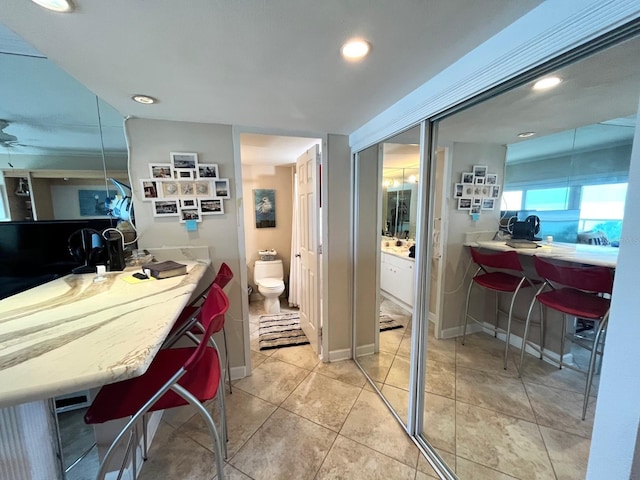 880 Mandalay Ave Unit N311, Clearwater Beach, FL 33767 - bathroom featuring vanity, recessed lighting, and tile patterned flooring