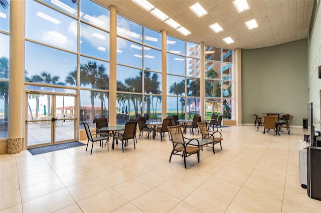 880 Mandalay Ave Unit N311, Clearwater Beach, FL 33767 - lobby with expansive windows and a towering ceiling