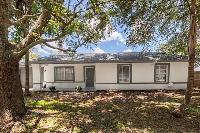 22716 Penny Loop, Land O Lakes, FL 34639 - ranch-style home featuring stucco siding and a shingled roof