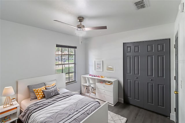 22716 Penny Loop, Land O Lakes, FL 34639 - bedroom with dark wood finished floors, a closet, and ceiling fan