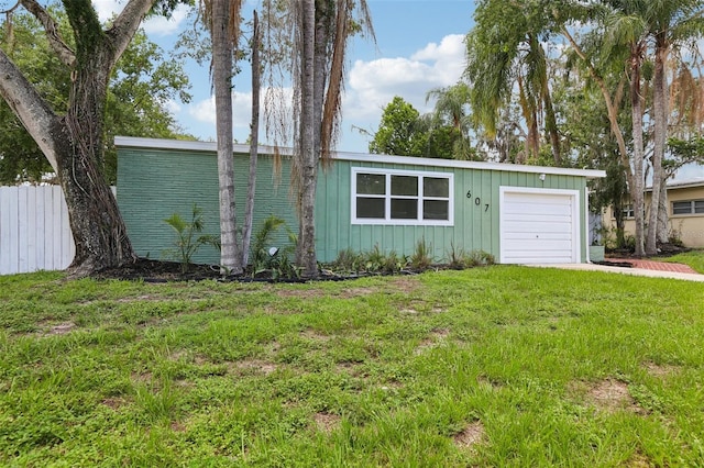 607 E River Dr, Temple Terrace, FL 33617 - view of front of house with a garage and board and batten siding