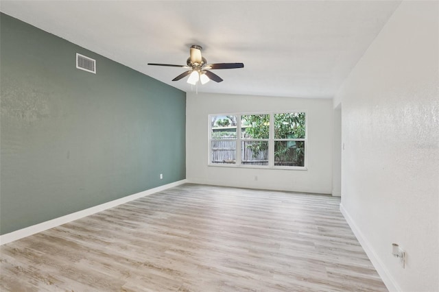 607 E River Dr, Temple Terrace, FL 33617 - unfurnished room featuring lofted ceiling, ceiling fan, and wood finished floors