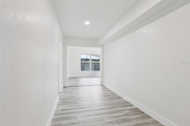 607 E River Dr, Temple Terrace, FL 33617 - hallway featuring light wood finished floors and recessed lighting