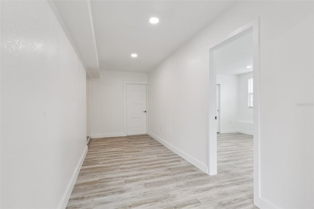 607 E River Dr, Temple Terrace, FL 33617 - hall with light wood-style flooring and recessed lighting