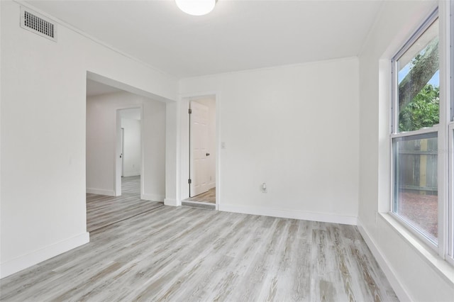 607 E River Dr, Temple Terrace, FL 33617 - spare room with light wood finished floors and baseboards