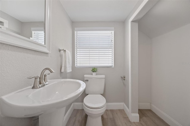 1048 W Lime St, Lakeland, FL 33815 - bathroom with wood finished floors and a sink
