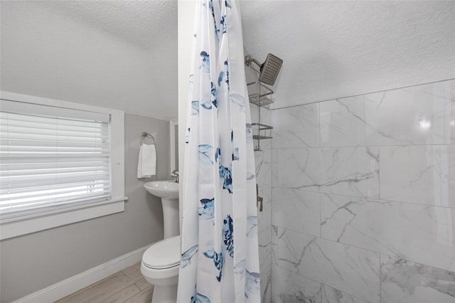 1048 W Lime St, Lakeland, FL 33815 - bathroom with a textured ceiling and a shower with curtain