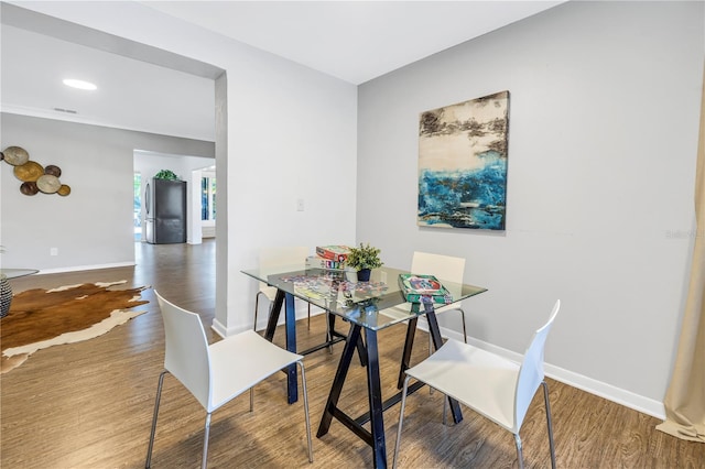 610 Cordova Blvd NE, Saint Petersburg, FL 33704 - dining space featuring wood finished floors and recessed lighting