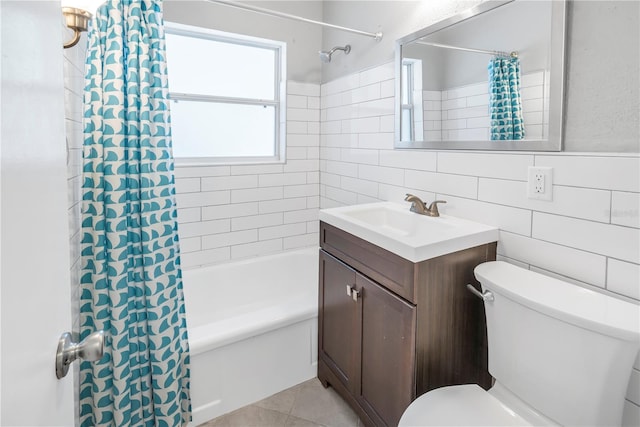610 Cordova Blvd NE, Saint Petersburg, FL 33704 - full bathroom with vanity, shower / bath combo, and tile walls