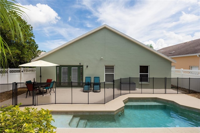 643 Blenheim Loop, Winter Springs, FL 32708 - rear view of house with a patio area, french doors, and a fenced backyard