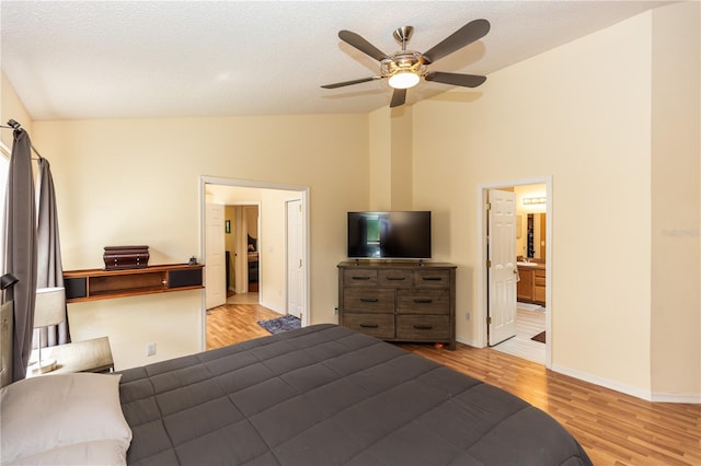 643 Blenheim Loop, Winter Springs, FL 32708 - bedroom with wood finished floors, high vaulted ceiling, ceiling fan, and connected bathroom