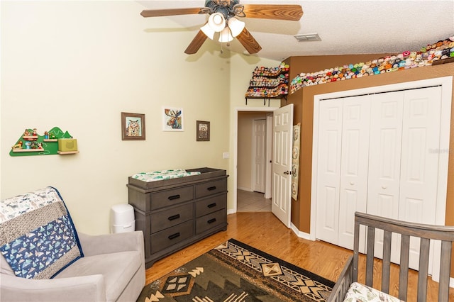 643 Blenheim Loop, Winter Springs, FL 32708 - bedroom featuring vaulted ceiling, light wood-style floors, a closet, and ceiling fan