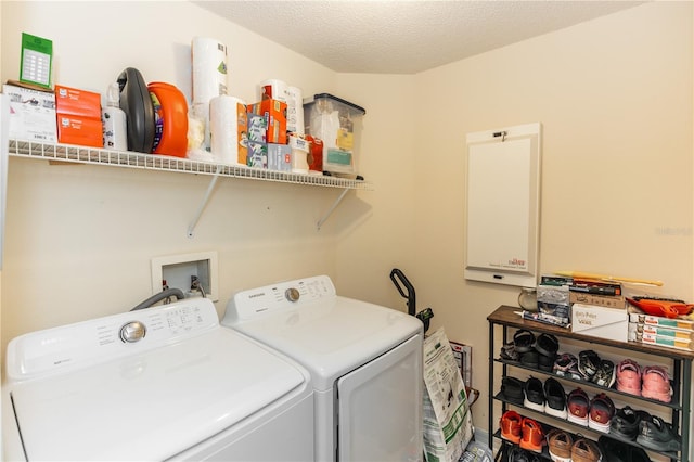 643 Blenheim Loop, Winter Springs, FL 32708 - laundry room with washer and clothes dryer and a textured ceiling