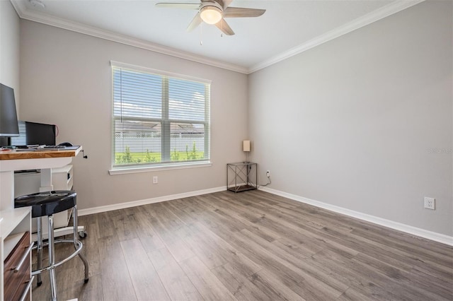 6879 Talamore Dr, Wesley Chapel, FL 33545 - unfurnished office featuring wood finished floors, ceiling fan, and ornamental molding