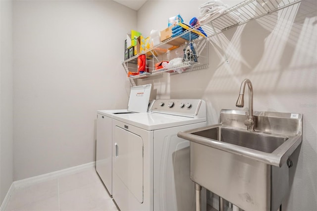 6879 Talamore Dr, Wesley Chapel, FL 33545 - washroom with independent washer and dryer and light tile patterned floors