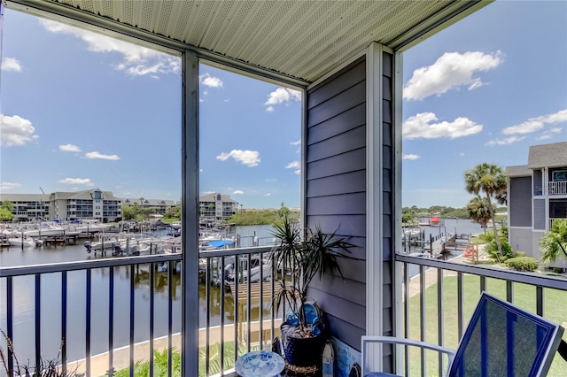 5722 Biscayne Ct Unit 107, New Port Richey, FL 34652 - balcony featuring a water view