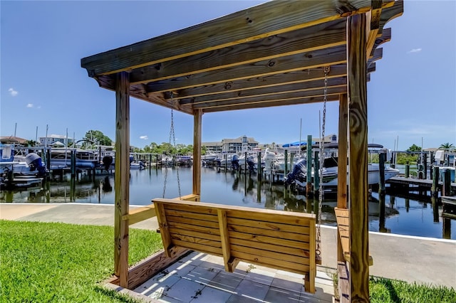 5722 Biscayne Ct Unit 107, New Port Richey, FL 34652 - dock featuring boat lift and a water view