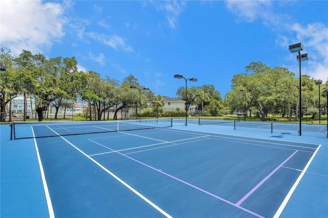 5722 Biscayne Ct Unit 107, New Port Richey, FL 34652 - view of tennis court featuring community basketball court