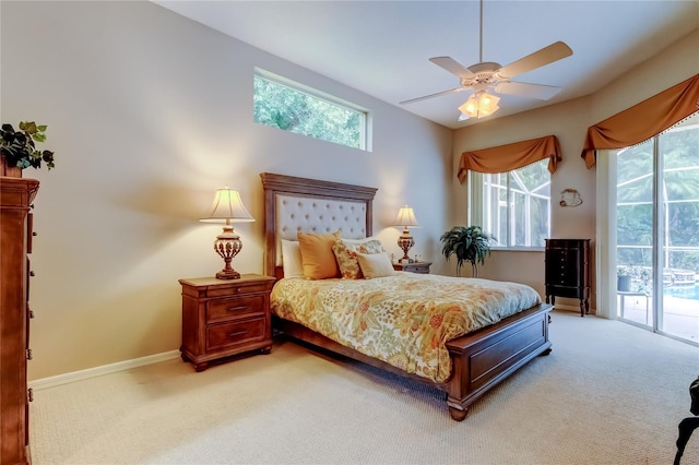 1827 Foxboro Ct, Oldsmar, FL 34677 - bedroom with light colored carpet, access to outside, multiple windows, and a ceiling fan
