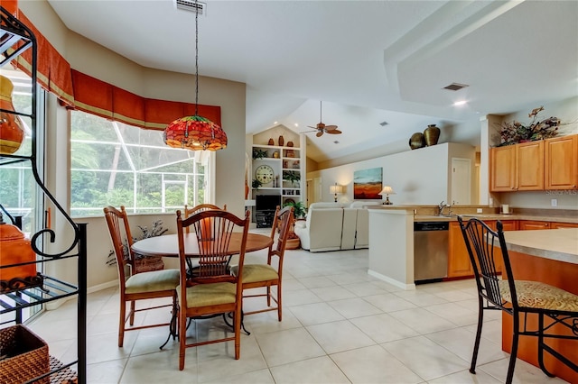 1827 Foxboro Ct, Oldsmar, FL 34677 - dining room featuring lofted ceiling, ceiling fan, and light tile patterned floors