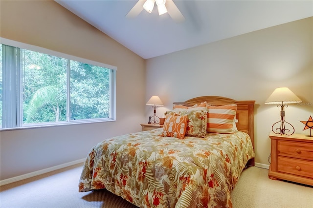 1827 Foxboro Ct, Oldsmar, FL 34677 - bedroom featuring light colored carpet, lofted ceiling, and a ceiling fan