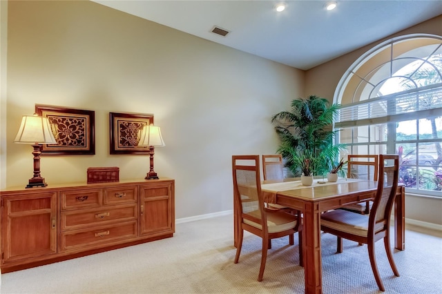 1827 Foxboro Ct, Oldsmar, FL 34677 - dining space with light colored carpet and baseboards
