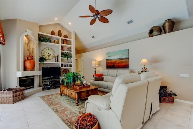 1827 Foxboro Ct, Oldsmar, FL 34677 - living area featuring light tile patterned floors, a ceiling fan, built in shelves, and high vaulted ceiling