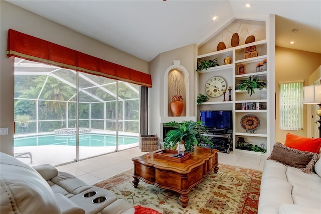 1827 Foxboro Ct, Oldsmar, FL 34677 - tiled living room with a sunroom, lofted ceiling, and built in features