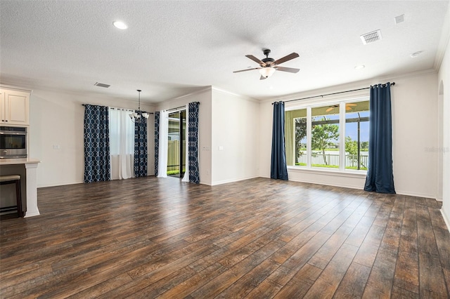 19209 Long Lake Ranch Blvd, Lutz, FL 33558 - unfurnished living room featuring a ceiling fan, dark wood-style floors, a textured ceiling, and crown molding