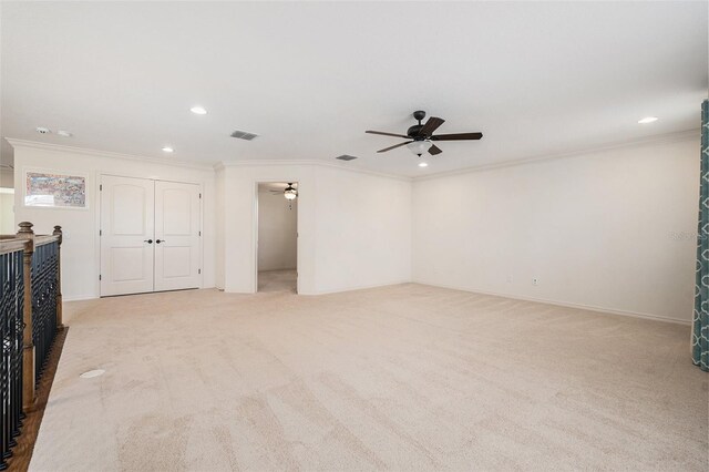 19209 Long Lake Ranch Blvd, Lutz, FL 33558 - unfurnished living room featuring a ceiling fan, light colored carpet, ornamental molding, and recessed lighting