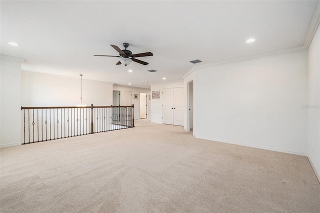 19209 Long Lake Ranch Blvd, Lutz, FL 33558 - unfurnished room featuring a ceiling fan, recessed lighting, light carpet, crown molding, and a chandelier