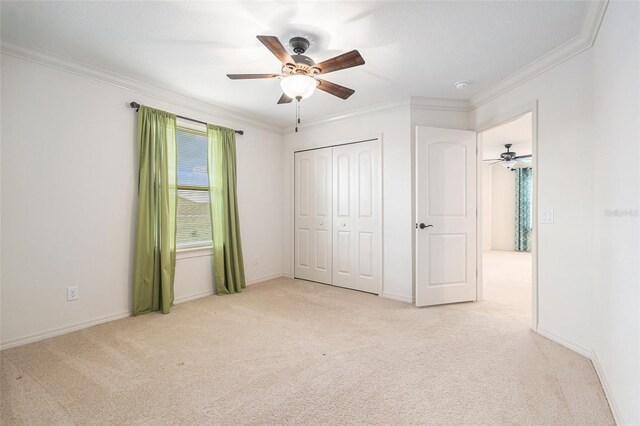 19209 Long Lake Ranch Blvd, Lutz, FL 33558 - unfurnished bedroom with light colored carpet, crown molding, a ceiling fan, and a closet