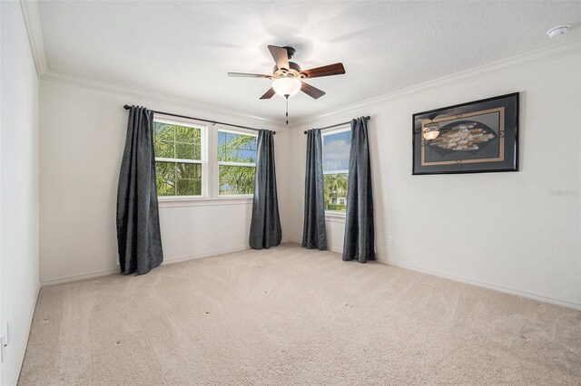 19209 Long Lake Ranch Blvd, Lutz, FL 33558 - carpeted empty room featuring crown molding, a ceiling fan, and a smoke detector