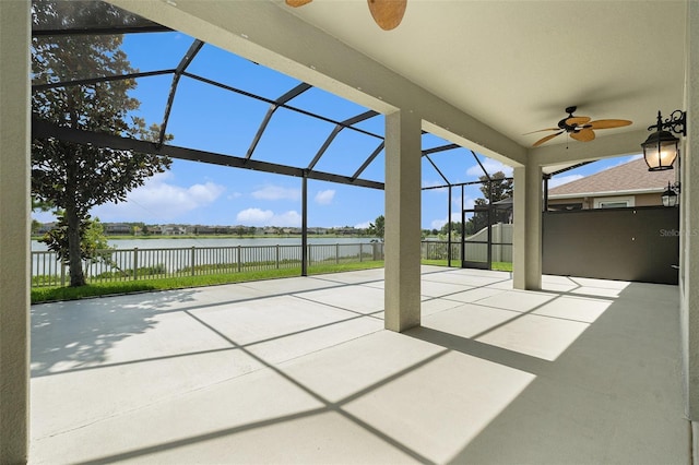 19209 Long Lake Ranch Blvd, Lutz, FL 33558 - view of patio featuring ceiling fan, a water view, and a lanai
