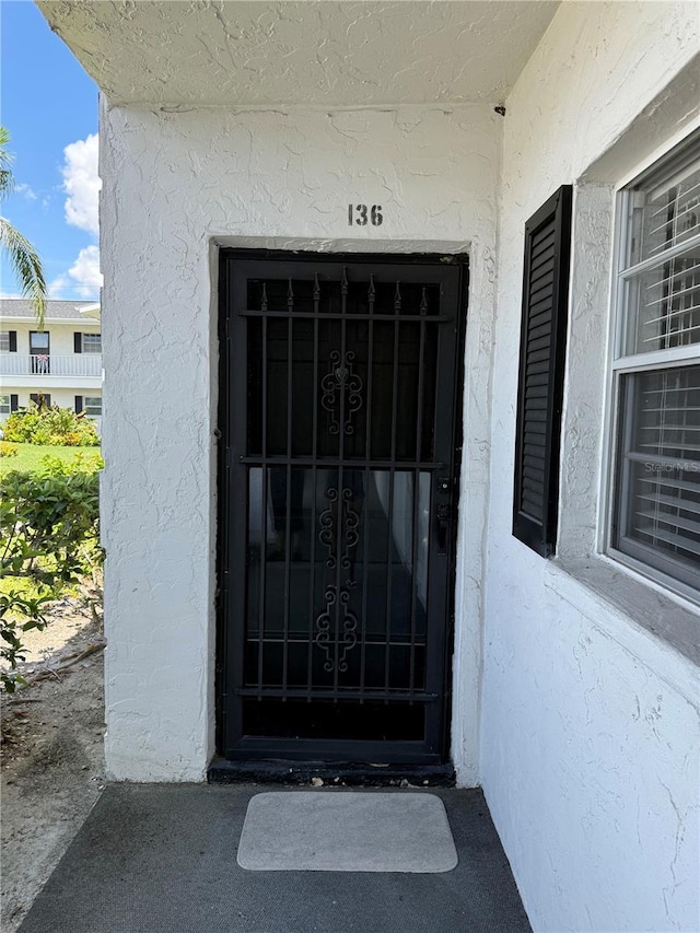 102 47th Avenue Dr W Unit 136, Bradenton, FL 34207 - entrance to property featuring stucco siding