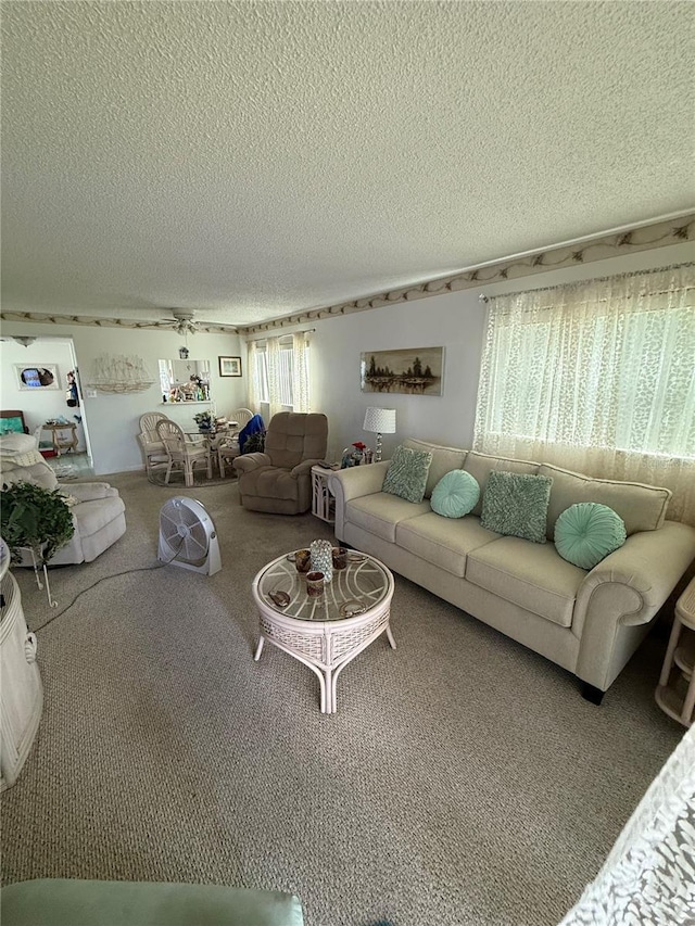 102 47th Avenue Dr W Unit 136, Bradenton, FL 34207 - living area featuring a textured ceiling and carpet floors