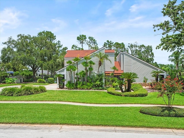 4118 Carrollwood Village Dr, Tampa, FL 33618 - view of front of property with a front yard