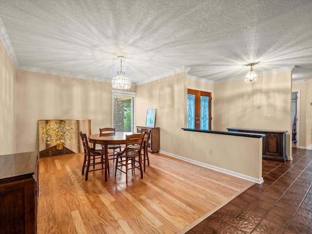 4118 Carrollwood Village Dr, Tampa, FL 33618 - dining space with a chandelier and crown molding