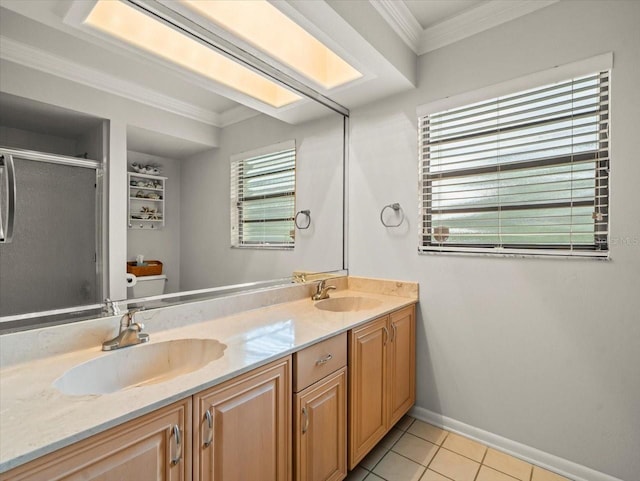 4118 Carrollwood Village Dr, Tampa, FL 33618 - bathroom featuring ornamental molding, a stall shower, double vanity, and tile patterned floors