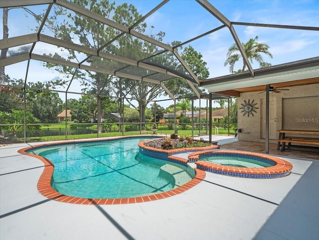 4118 Carrollwood Village Dr, Tampa, FL 33618 - view of swimming pool with a ceiling fan, a patio area, a pool with connected hot tub, and a lanai