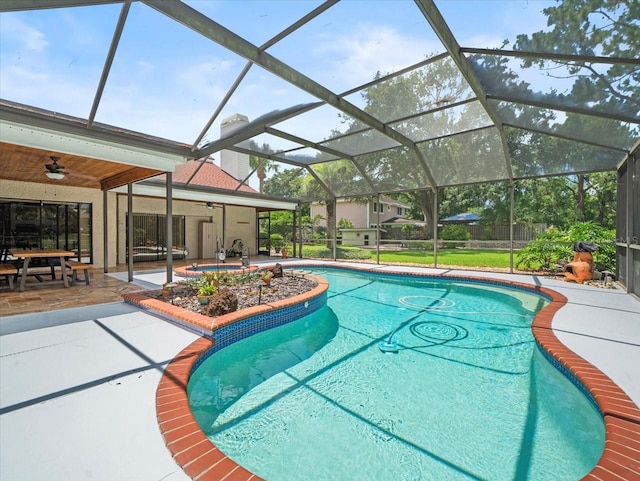 4118 Carrollwood Village Dr, Tampa, FL 33618 - outdoor pool with a ceiling fan, a patio area, and glass enclosure
